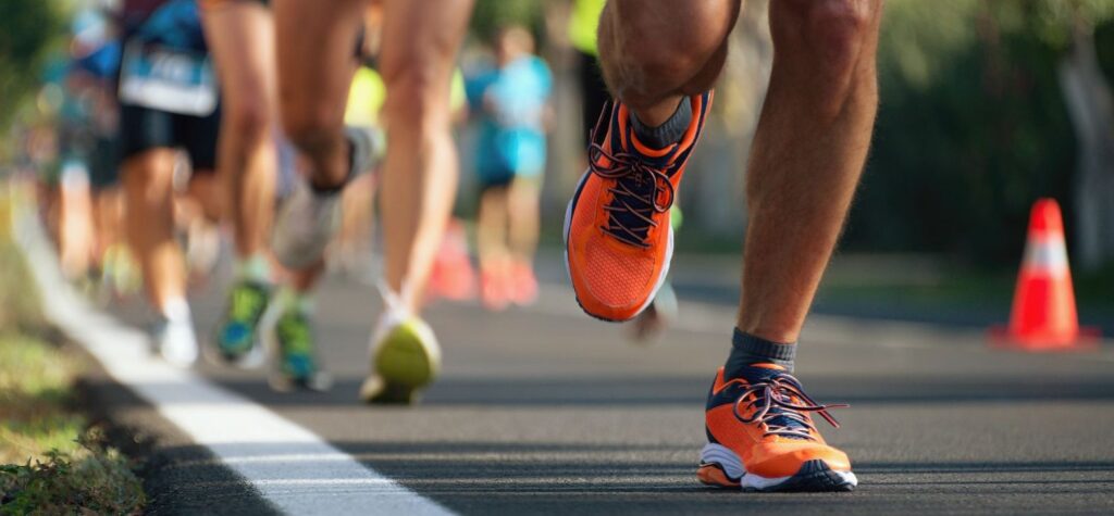 Image of legs running along a road